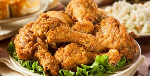 Fried chicken on a plate with lettuce