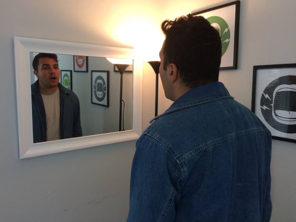 a man looking in the mirror