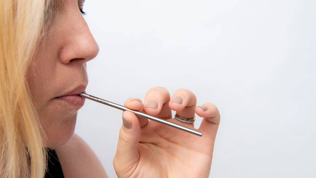 Woman Performing the Straw Exercise